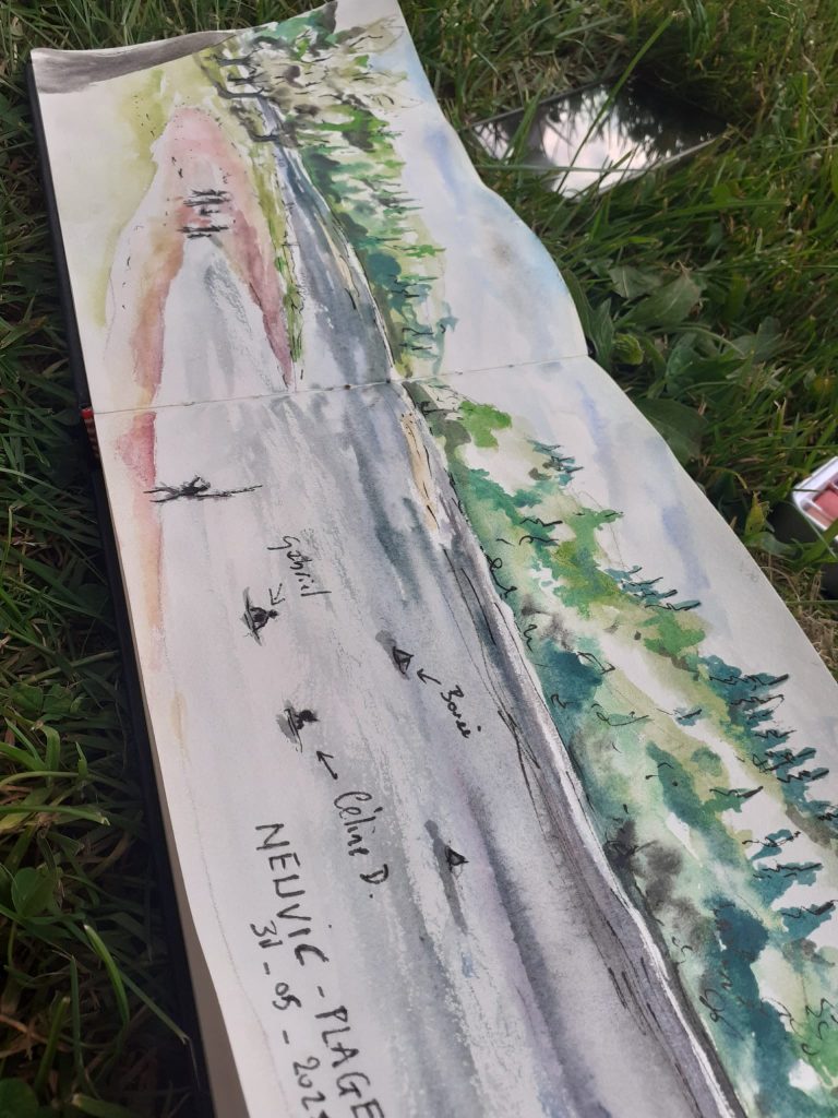 Peinture aquarelle d'un paysage sur un carnet représentant un lac